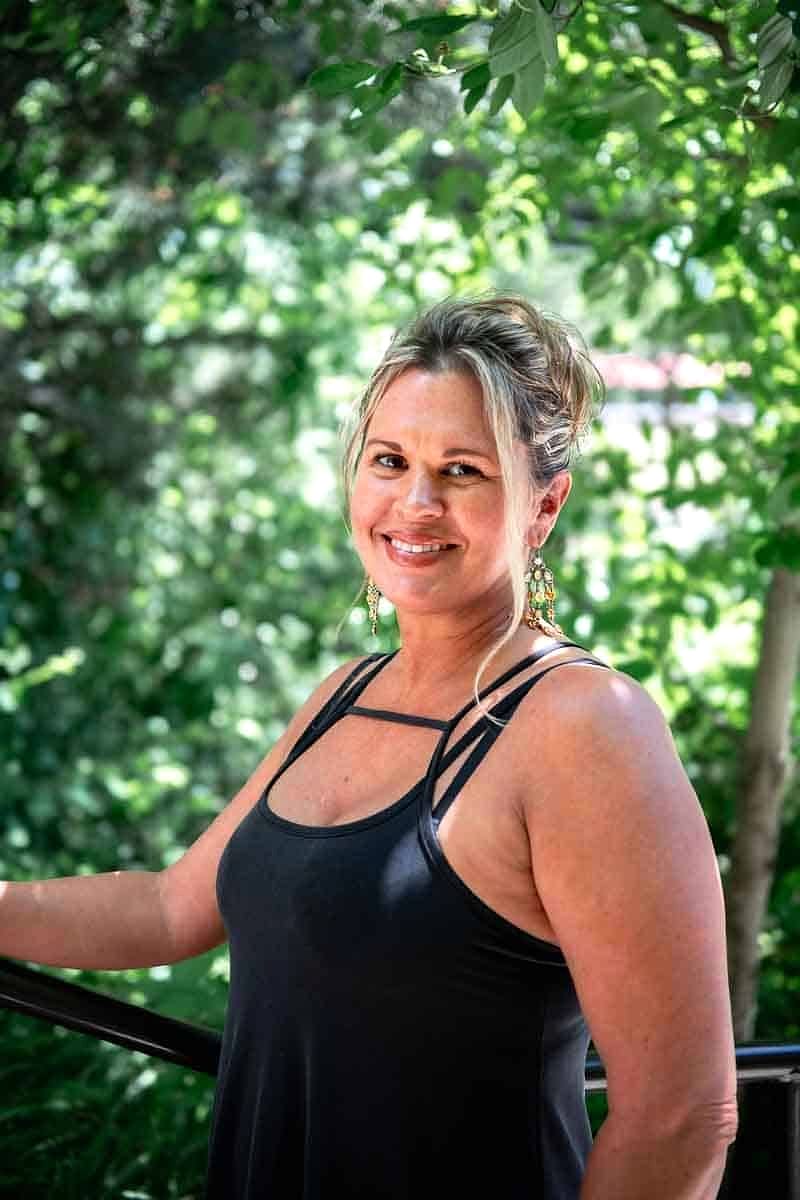 A Salon Sister with her hair in an updo